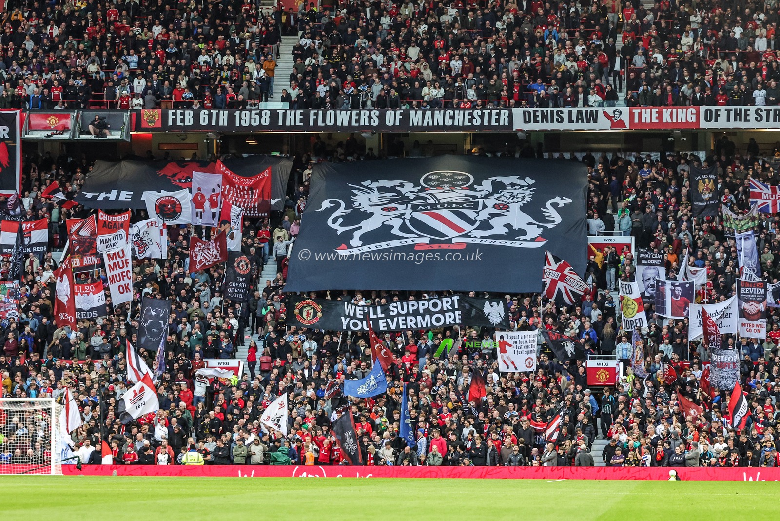 Manchester United fans hold up flags before the game during the Premier League match Manchester United vs Brentford at Old Trafford, Manchester, United Kingdom on 27 April 2026

(Photo by Mark Cosgrove/News Images)