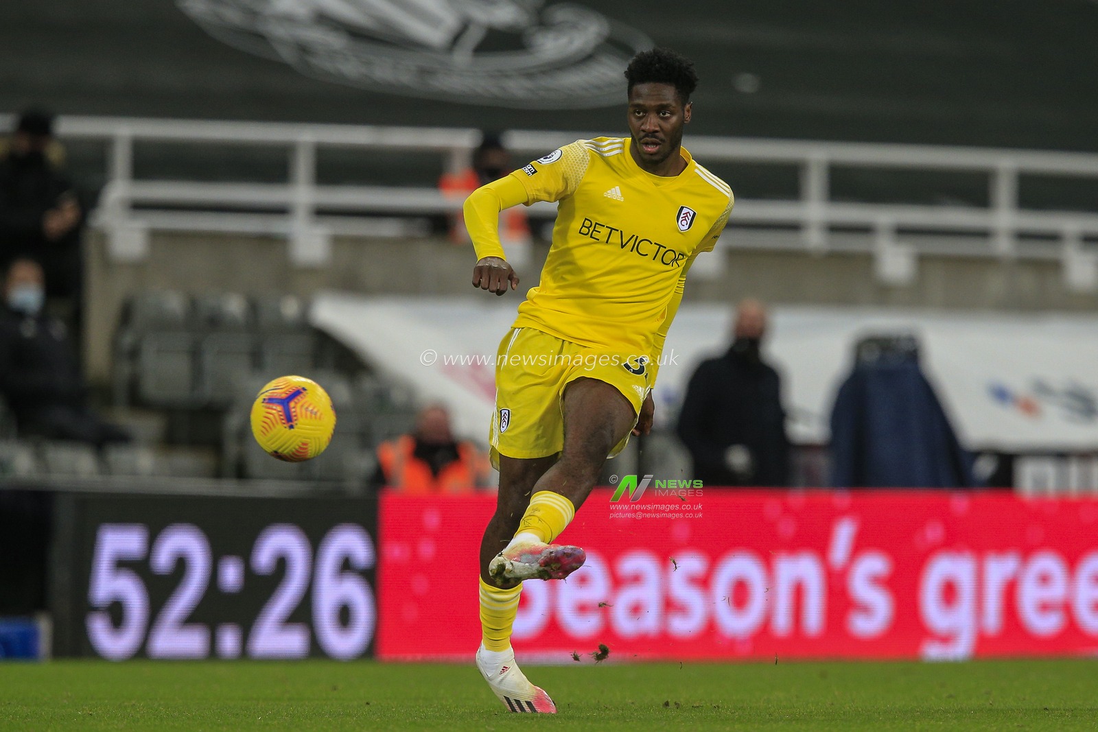 Ola Aina #34 of Fulham with the ball