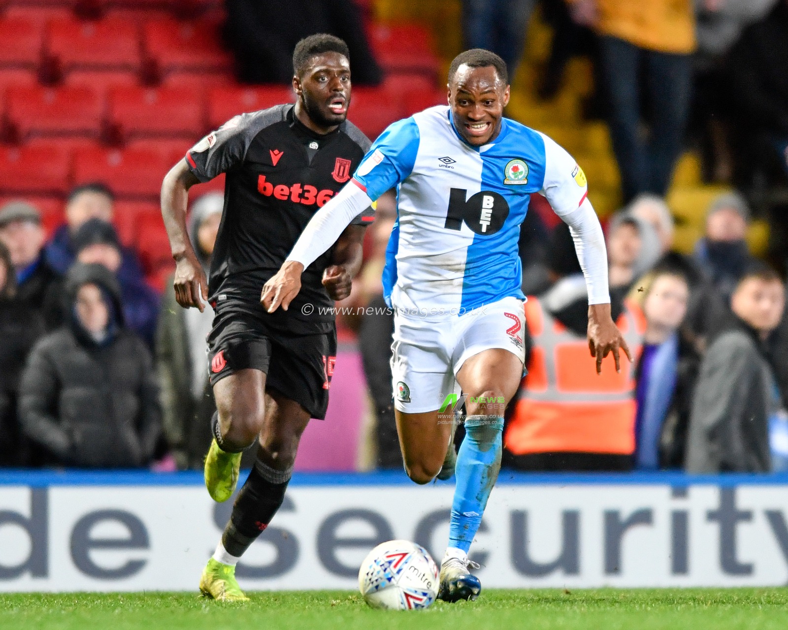 26th February 2020, Ewood Park, Blackburn, England; Sky Bet Championship, Blackburn Rovers v Stoke City : Ryan Nyambe (2) of Blackburn Rovers beats Bruno Martins Indi (15) of Stoke City to the ball