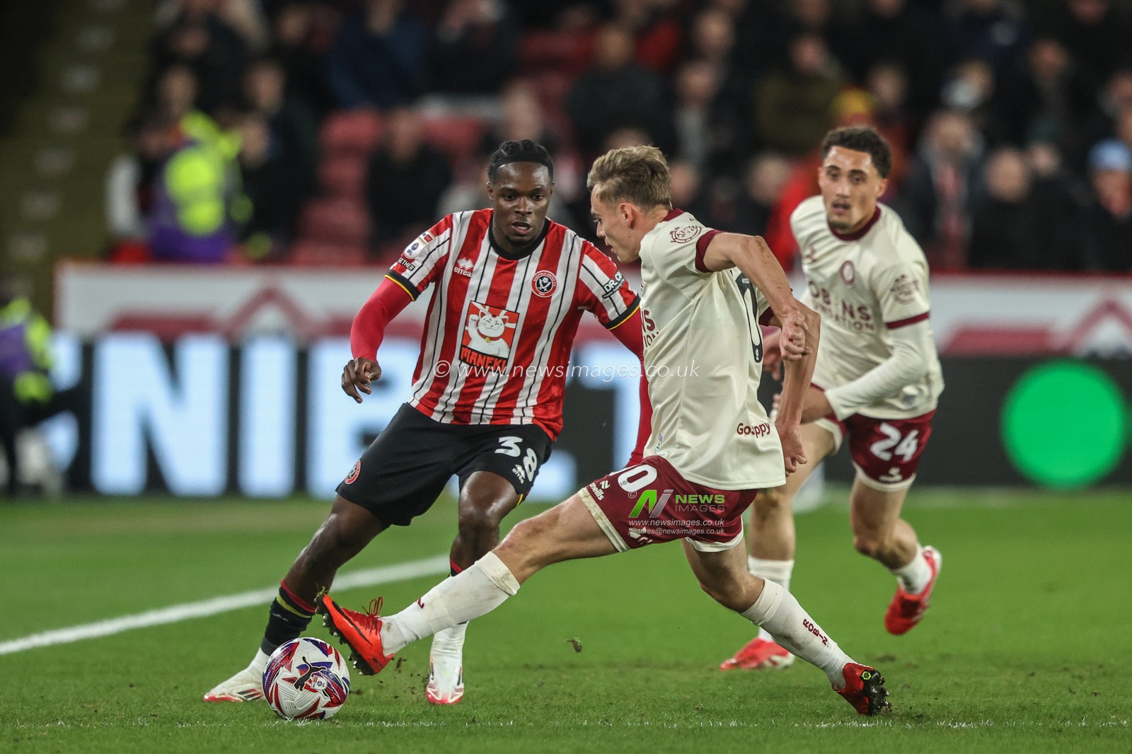 Femi Seriki of Sheffield United is tackled by Sam Bell of Bristol City during the Sky Bet Championship match Sheffield United vs Bristol City at Bramall Lane, Sheffield, United Kingdom, 11th March 2025

(Photo by Alfie Cosgrove/News Images)