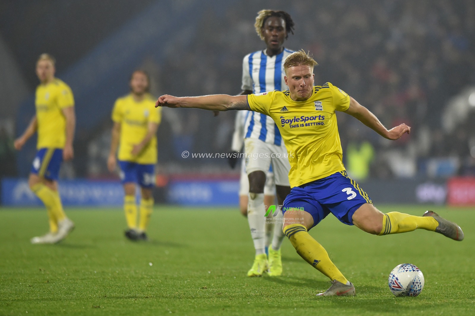 23rd November 2019, John Smith's Stadium, Huddersfield, England; Sky Bet Championship, Huddersfield Town v Birmingham City : Kristian Pedersen (3) of Birmingham City takes a shot.

Credit: Dean Williams/News Images
