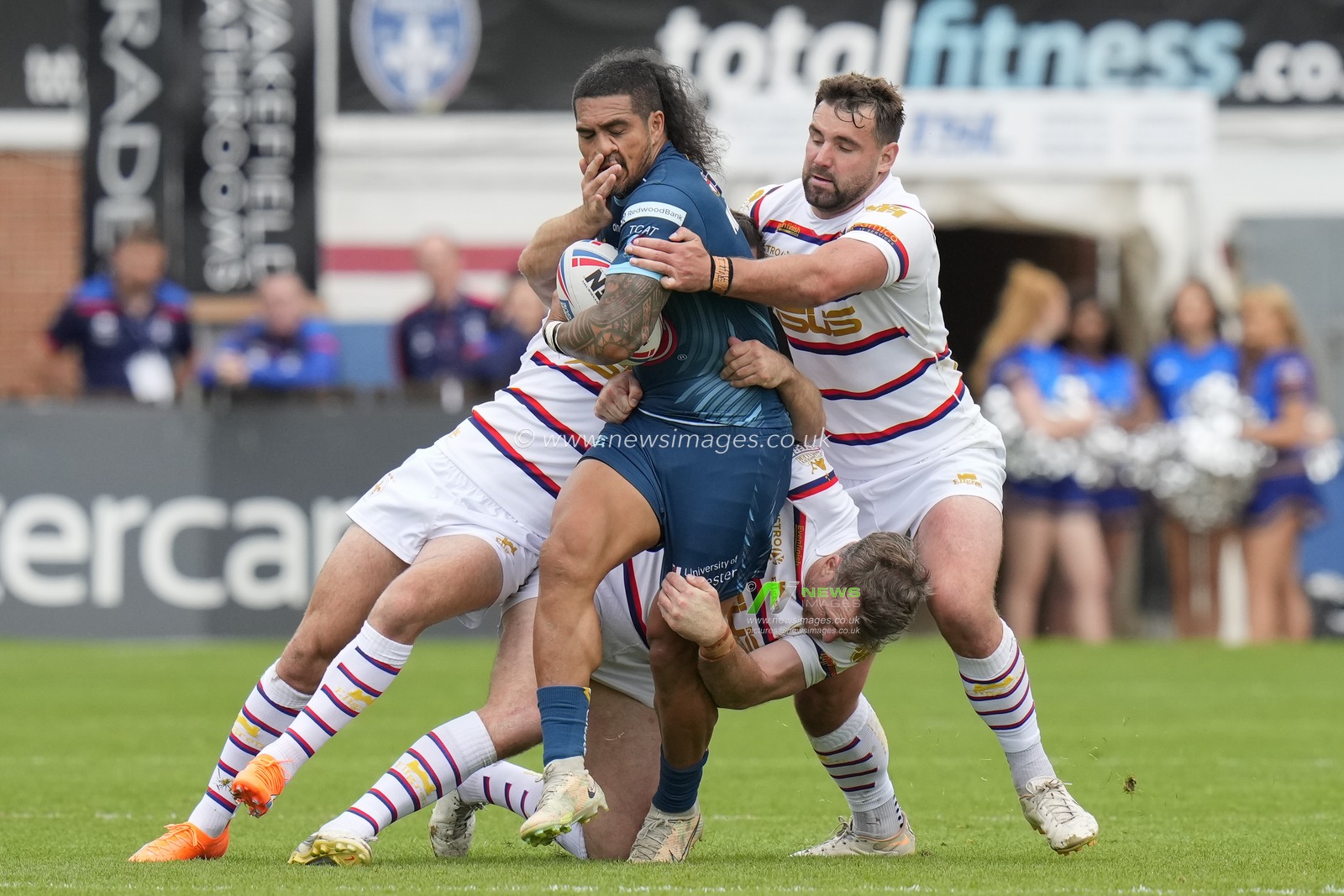 Josh Bowden #15 of Wakefield Trinity tackles Pete Mataâ€™utia #3 of Warrington Wolves during the Betfred Super League Round 20 match Wakefield Trinity vs Warrington Wolves at The Be Well Support Stadium, Wakefield, United Kingdom, 30th July 2023

(Photo by Steve Flynn/News Images)