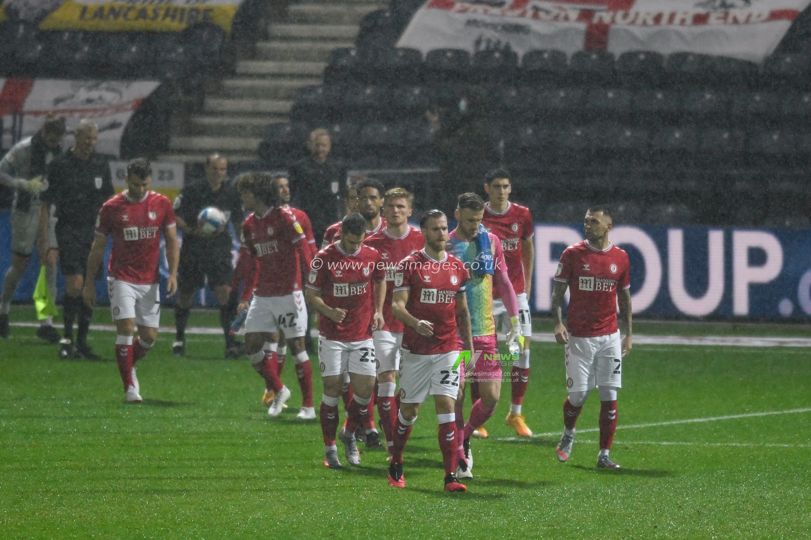 The Bristol City players enter the pitch