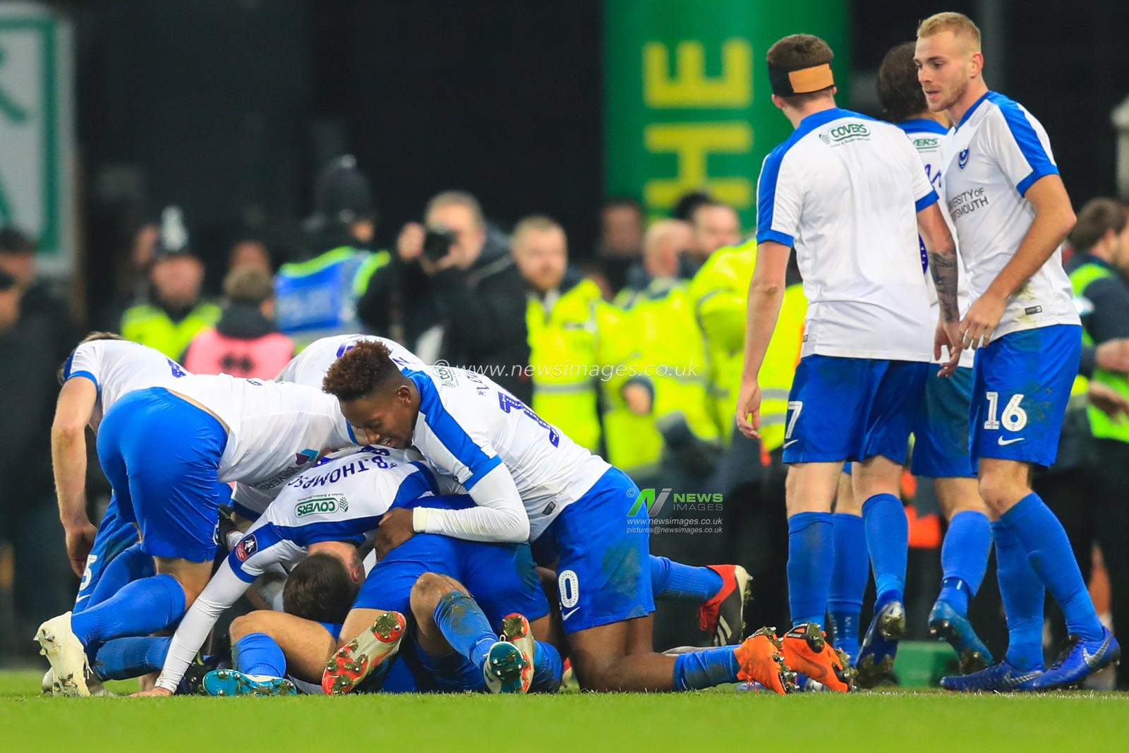 5th January 2019, Carrow Road, Norfolk, England; The Emirates FA Cup, 3rd Round, Norwich City vs Portsmouth ;  Portsmouth celebrate Andre Green's winning goal to make it 0-1.

Credit: Georgie Kerr/News Images

English Football League images are subject to DataCo Licence