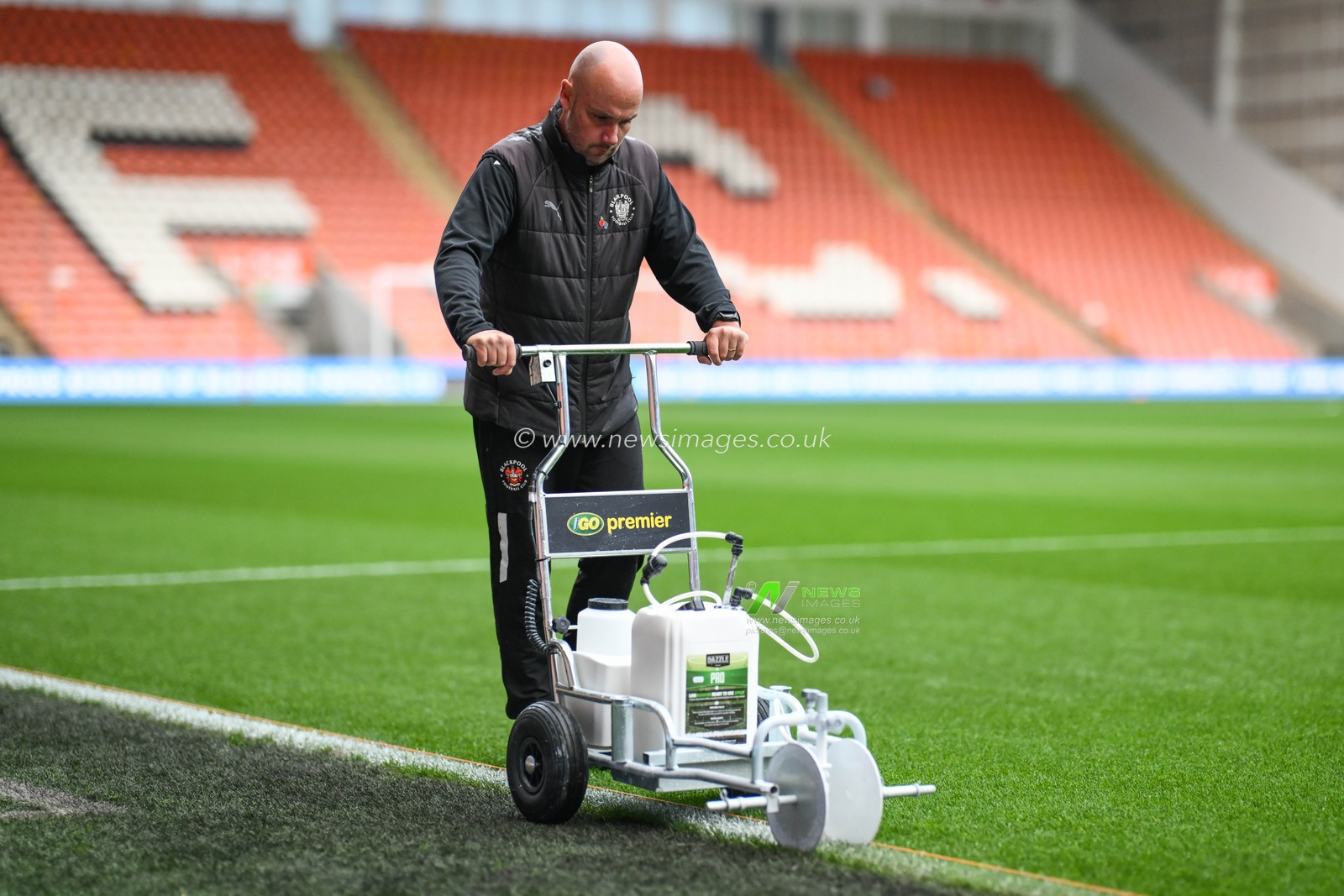 Blackpool groundsman paints the lines ahead of the Bristol Street Motors Trophy match Blackpool vs Liverpool U21 at Bloomfield Road, Blackpool, United Kingdom, 6th November 2024

(Photo by Craig Thomas/News Images)
