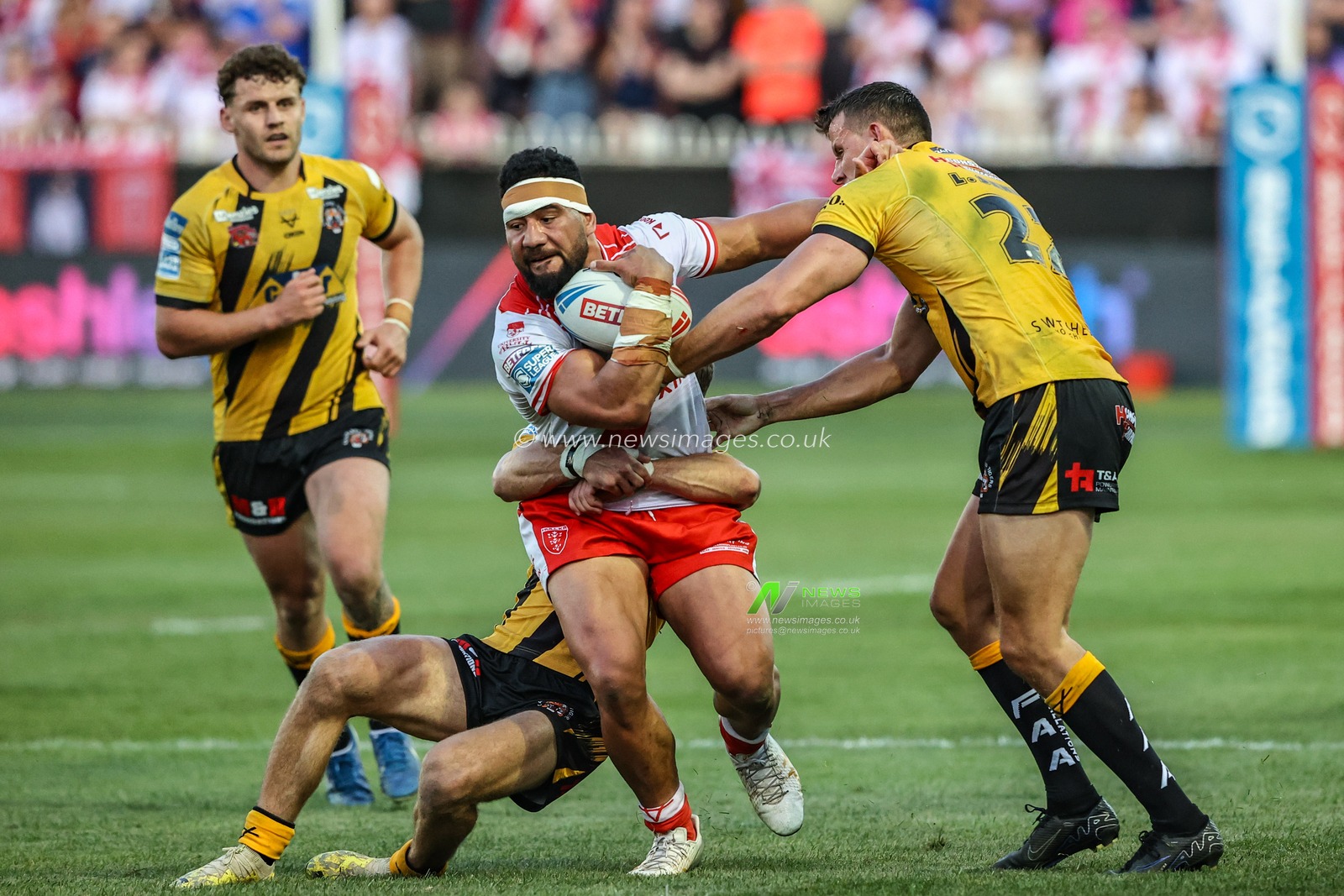 Kelepi Tanginoa of Hull KR is tackled during the Betfred Super League round 15 match Castleford Tigers vs Hull KR at The Mend-A-Hose Jungle, Castleford, United Kingdom, 19th June 2025

(Photo by Alfie Cosgrove/News Images)