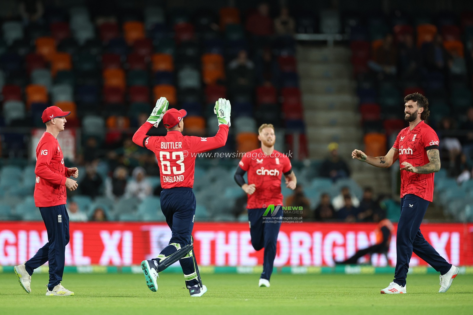 Jos Buttler (c) of England celebrates rates after David Warner of Australia is dismissed during the Dettol T20I Series 2 of 3 match Australia vs England at Manuka Oval, Canberra, Australia, 12th October 2022

(Photo by Patrick Hoelscher/News Images)