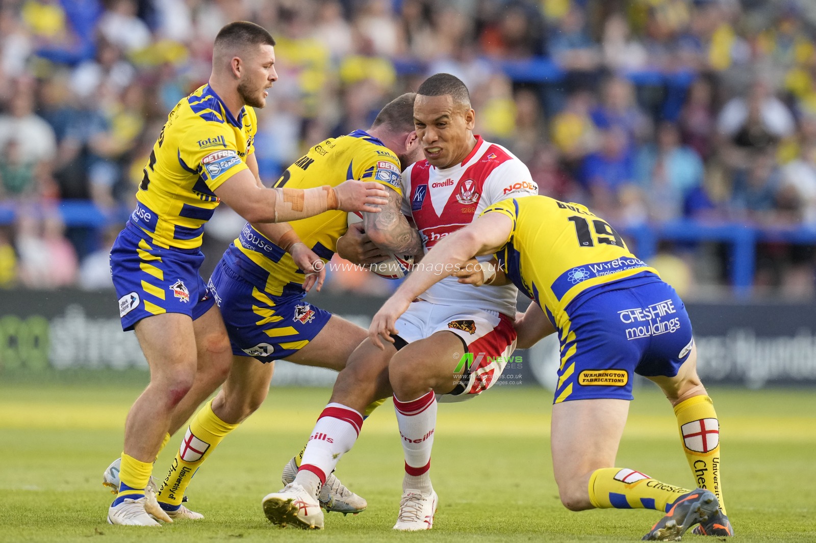 Joe Bullock #19 of Warrington Wolves tackles Will Hopoate #3 of St. Helens during the Betfred Super League Round 18 match Warrington Wolves vs St Helens at Halliwell Jones Stadium, Warrington, United Kingdom, 7th July 2023

(Photo by Steve Flynn/News Images)