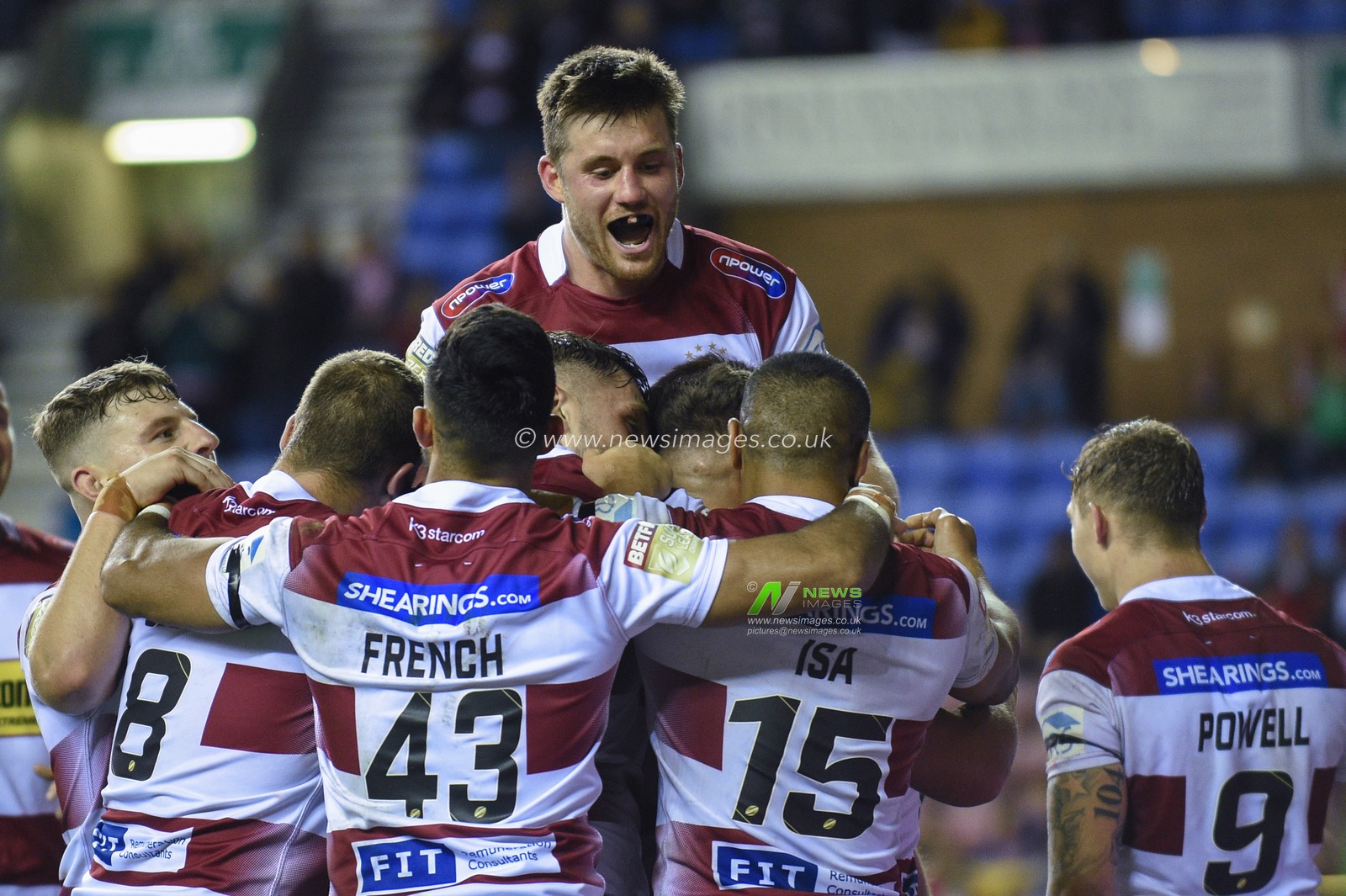 12th September 2019 , DW Stadium, Wigan, England;  Betfred Super League Rugby, Round 29, Wigan Warriors vs Castleford Tigers ; Morgan Smithies (38) of Wigan Warriors celebrates his try with team mates

Credit: Richard Long/News Images