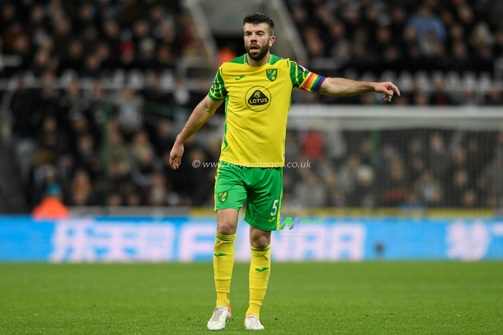 Grant Hanley #5 of Norwich City gives instructions during the game