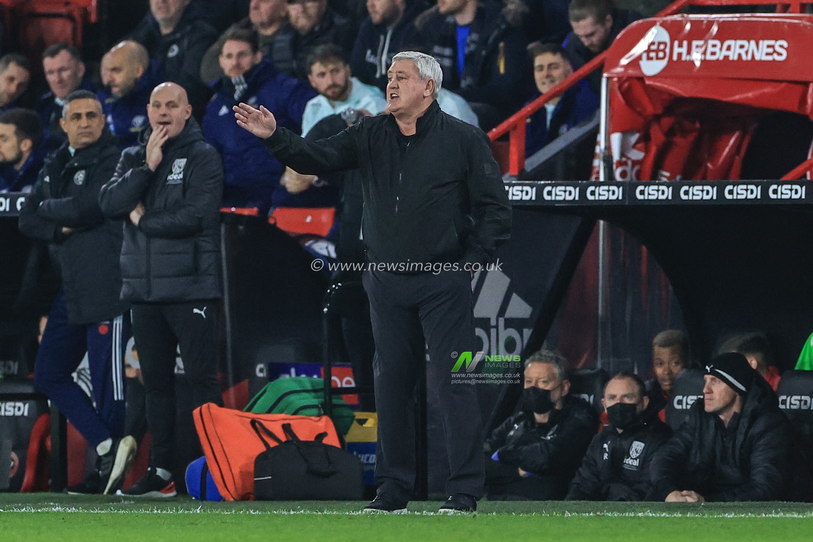 Steve Bruce manager of West Bromwich Albion gives his team instructions