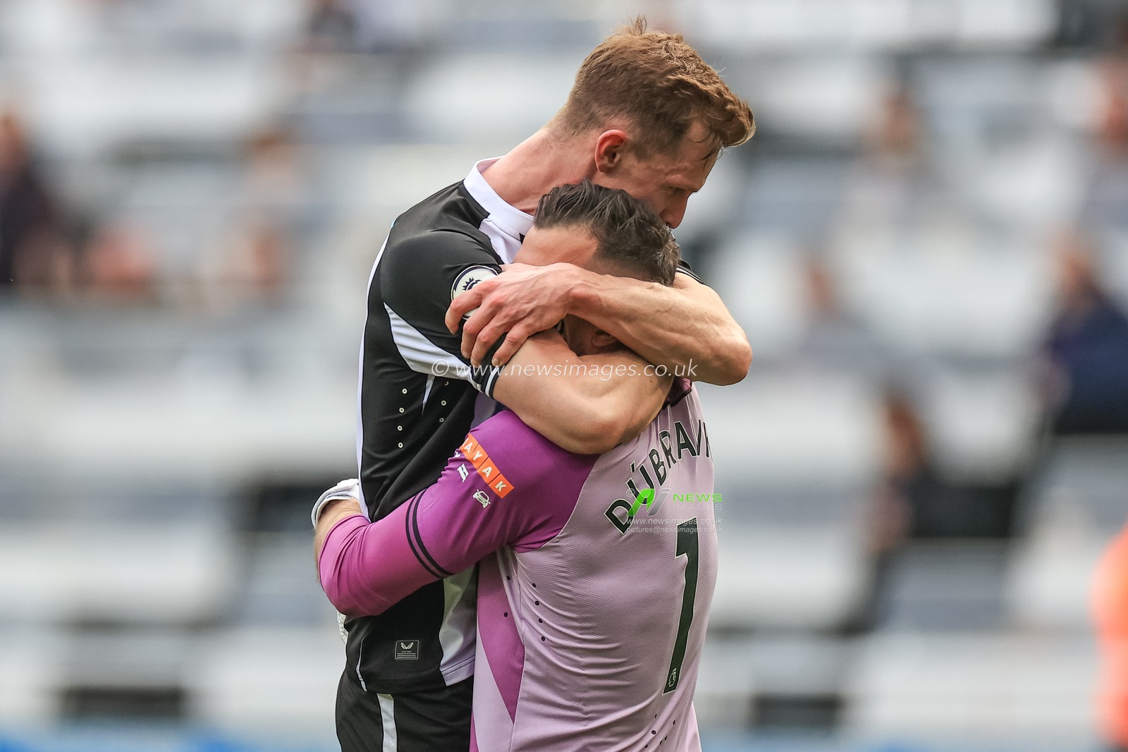 Emil Krafth #17 of Newcastle United celebrates the 2-1 win over Leicester City with Martin Dubravka #1 of Newcastle United