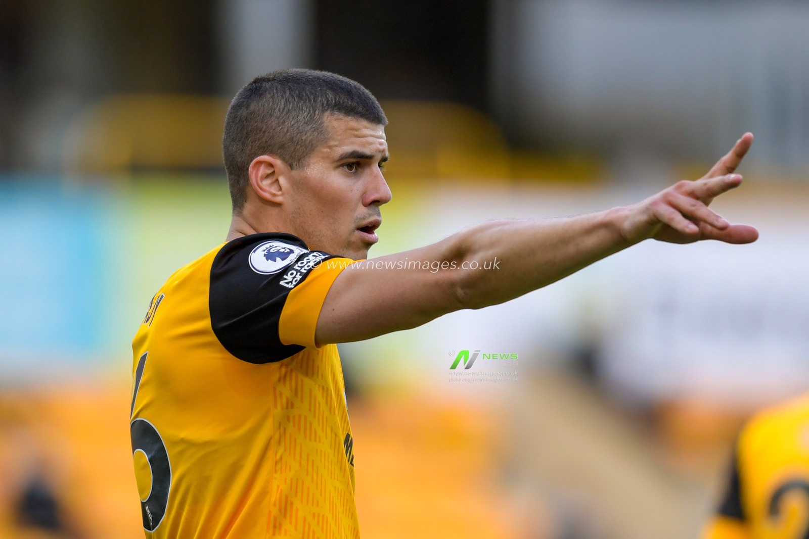 Conor Coady #16 of Wolverhampton Wanderers gives instructions during the game