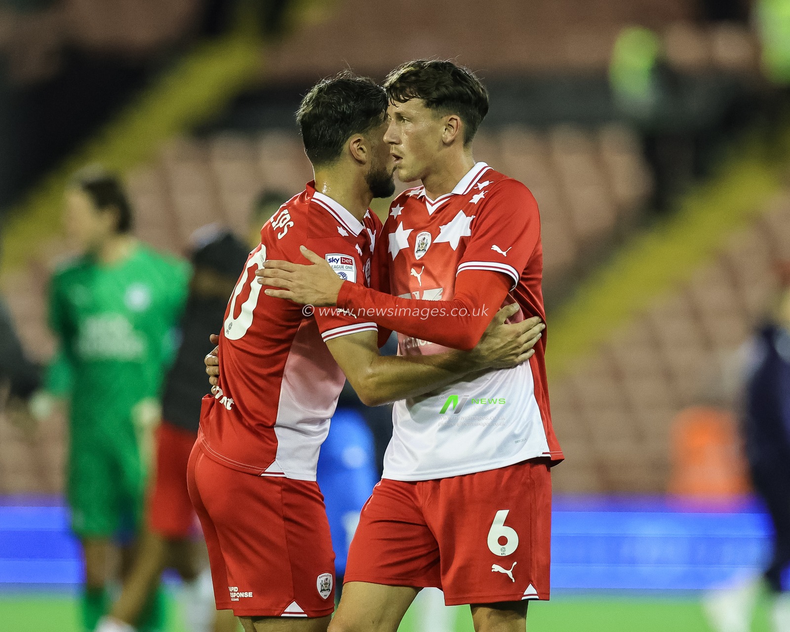 Adam Phillips #30 of Barnsley embraces MaÃ«l de Gevigney #6 of Barnsley during the Sky Bet League 1 match Barnsley vs Peterborough at Oakwell, Barnsley, United Kingdom, 15th August 2023

(Photo by Mark Cosgrove/News Images)