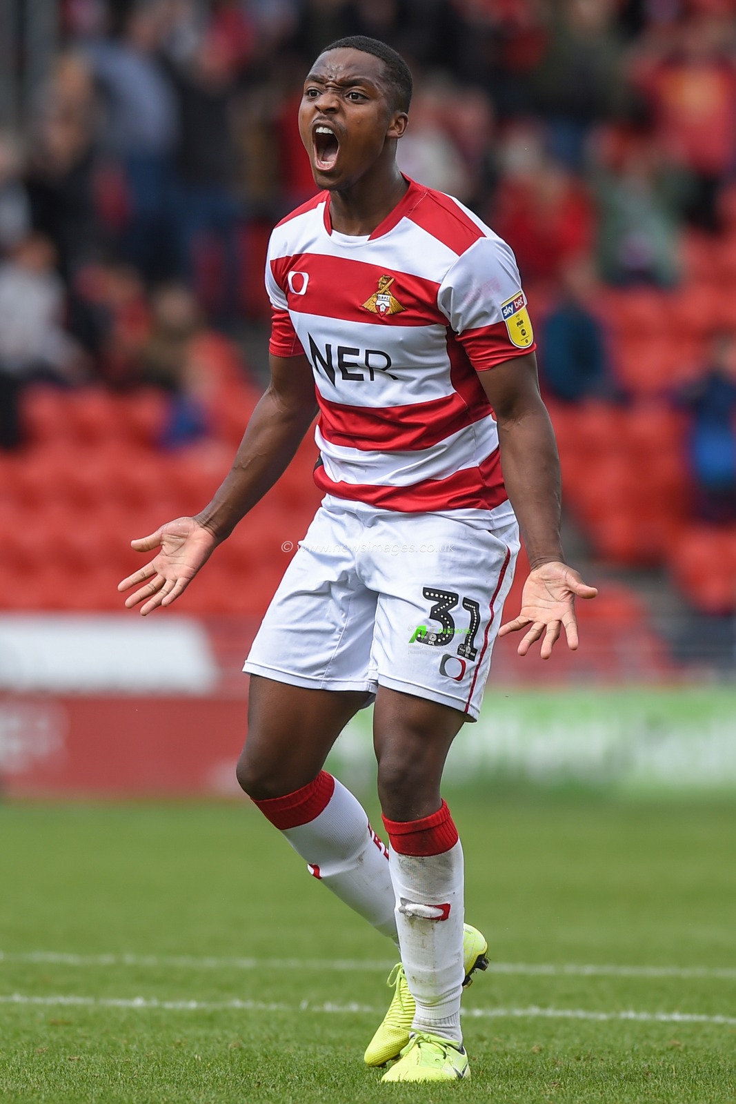 7th September 2019, Keepmoat Stadium, Doncaster, England; Sky Bet League One Football, Doncaster Rovers vs Rotherham United ; Niall Ennis (31) of Doncaster Rovers of celebrates winnning a penalty.
Credit: Dean Williams/News Images

English Football League images are subject to DataCo Licence