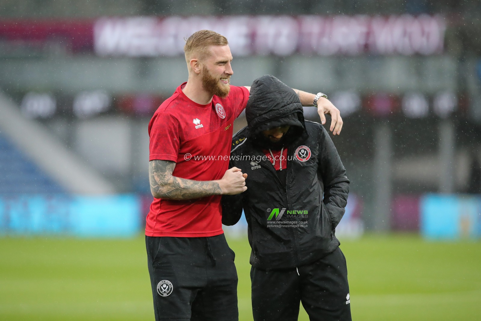 Oliver McBurnie #9 of Sheffield United puts his arm around Iliman Ndiaye #29 of Sheffield United during the pre match pitch inspection ahead of the Sky Bet Championship match Burnley vs Sheffield United at Turf Moor, Burnley, United Kingdom, 10th April 2023

(Photo by James Heaton/News Images)