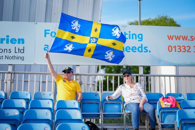 A  fans waves the Durham flag during the Vitality Blast T20 match between Derbyshire Falcons and Durham Cricket at The Central Co-Op County Ground, Derby, United Kingdom on 22 May 2026

(Photo by Maynard Manyowa/News Images)