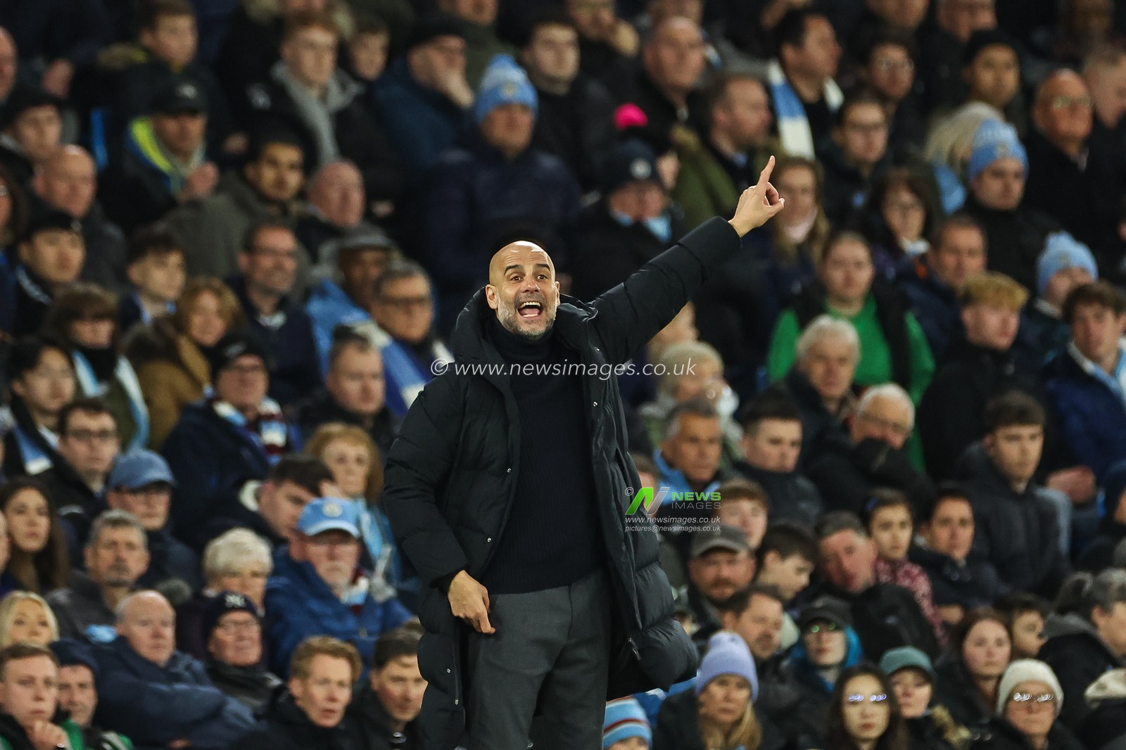 Pep Guardiola manager of Manchester City gives his team instructions during the Premier League match Manchester City vs Aston Villa at Etihad Stadium, Manchester, United Kingdom, 3rd April 2024

(Photo by Mark Cosgrove/News Images)