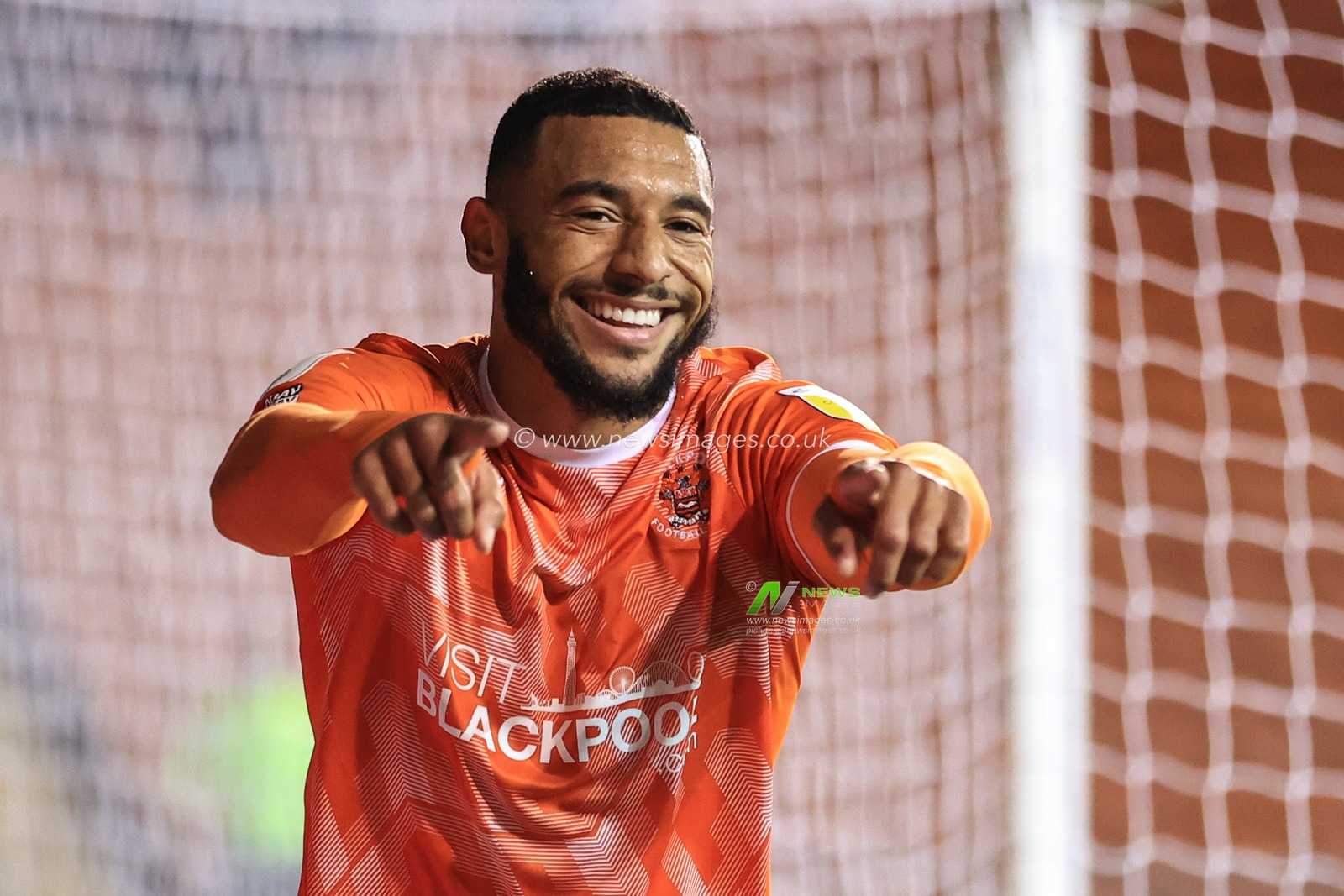 Keshi Anderson #10 of Blackpool celebrates his goal to make it 3-0
