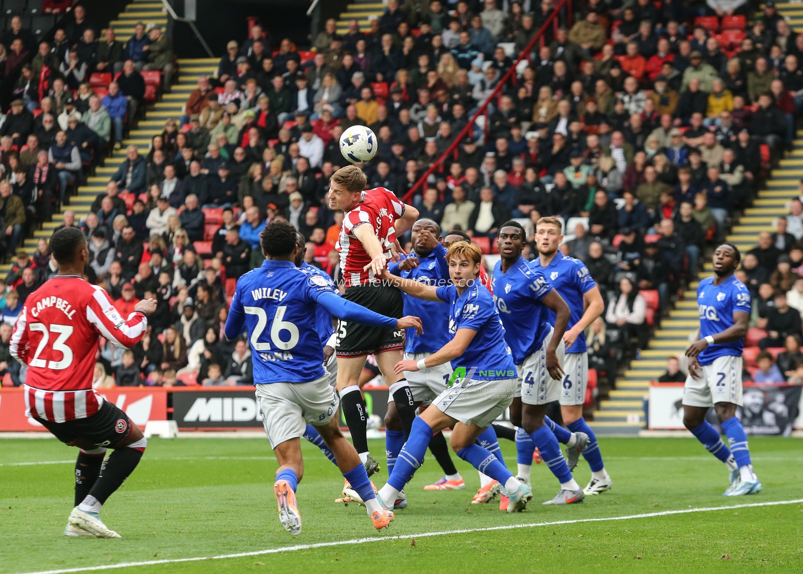 Mark McGuinness of Sheffield United jumps up to win the high ball during the Sky Bet Championship match Sheffield United vs Watford at Bramall Lane, Sheffield, United Kingdom, 18th October 2025

(Photo by Richard Bierton/News Images)
