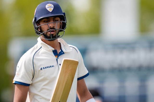 Shoaib Bashir walks off after being given out LBW off the bowling of Graeme van Buuren as Gloucestershire players celebrate a wicket during the County Championship Division Two Derbyshire v Gloucestershire at The Central Co-Op County Ground, Derby, United Kingdom on 26 April 2026

(Photo by Maynard Manyowa/News Images)
