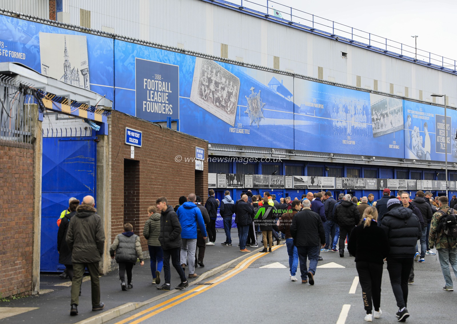 19th October 2019, Goodison Park, Liverpool, England; Premier League, Everton v West Ham United : Fans arriving for the game outside Goodison

Credit: Conor Molloy/News Images