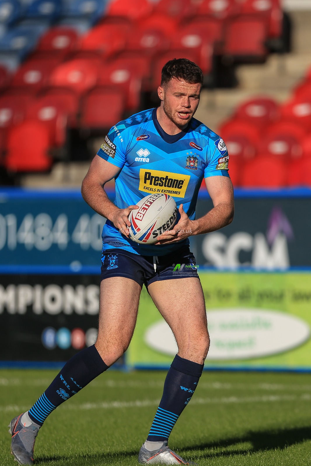 21st June 2019 , John Smiths Stadium, Huddersfield, England; Betfred Super League, Round 19, Huddersfield Giants vs Wigan Warriors ; Joe Burgess (5) of Wigan Warriors warming up 


Credit: Mark Cosgrove/News Images