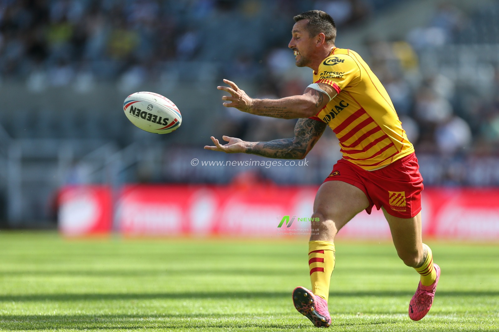 Mitchell Pearce #6 of Catalans Dragons in action during the game