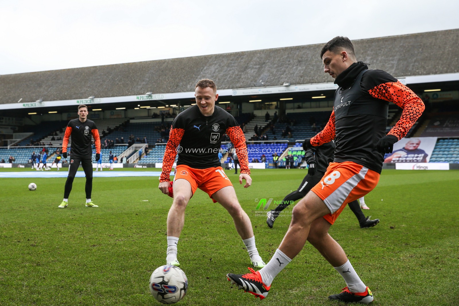 Blackpool players during the pre-game warm up ahead of the Sky Bet League 1 match Peterborough United vs Blackpool at Weston Homes Stadium, Peterborough, United Kingdom, 17th February 2024

(Photo by Gareth Evans/News Images)