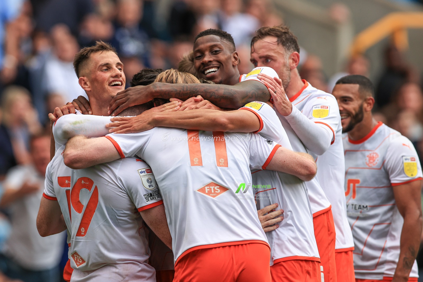 Shayne Lavery #19 of Blackpool celebrates his goal to make it 0-1 with team mates