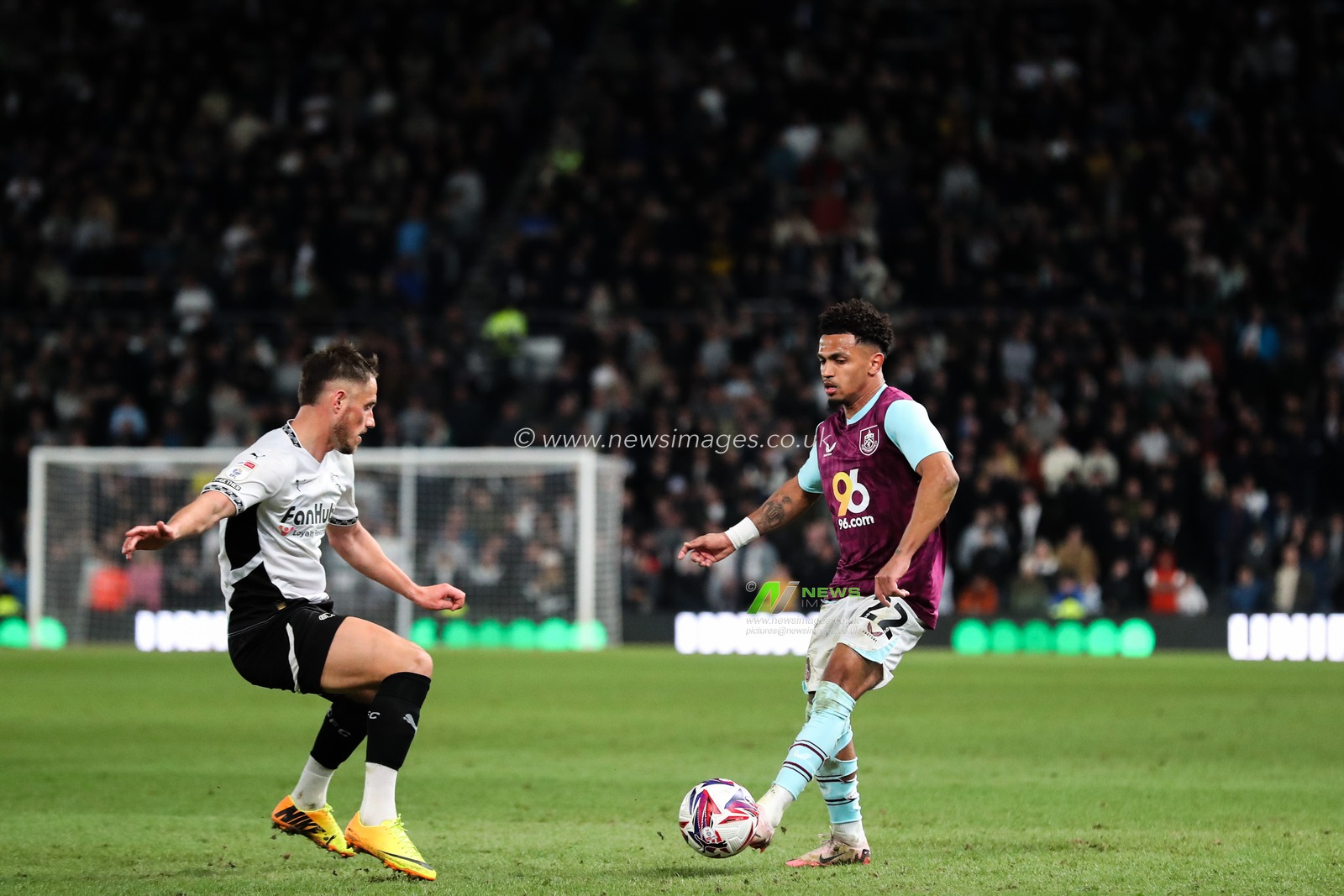 Marcus Edwards of Burnley passes the ball during the Sky Bet Championship match Derby County vs Burnley at Pride Park Stadium, Derby, United Kingdom, 8th April 2025

(Photo by Gareth Evans/News Images)