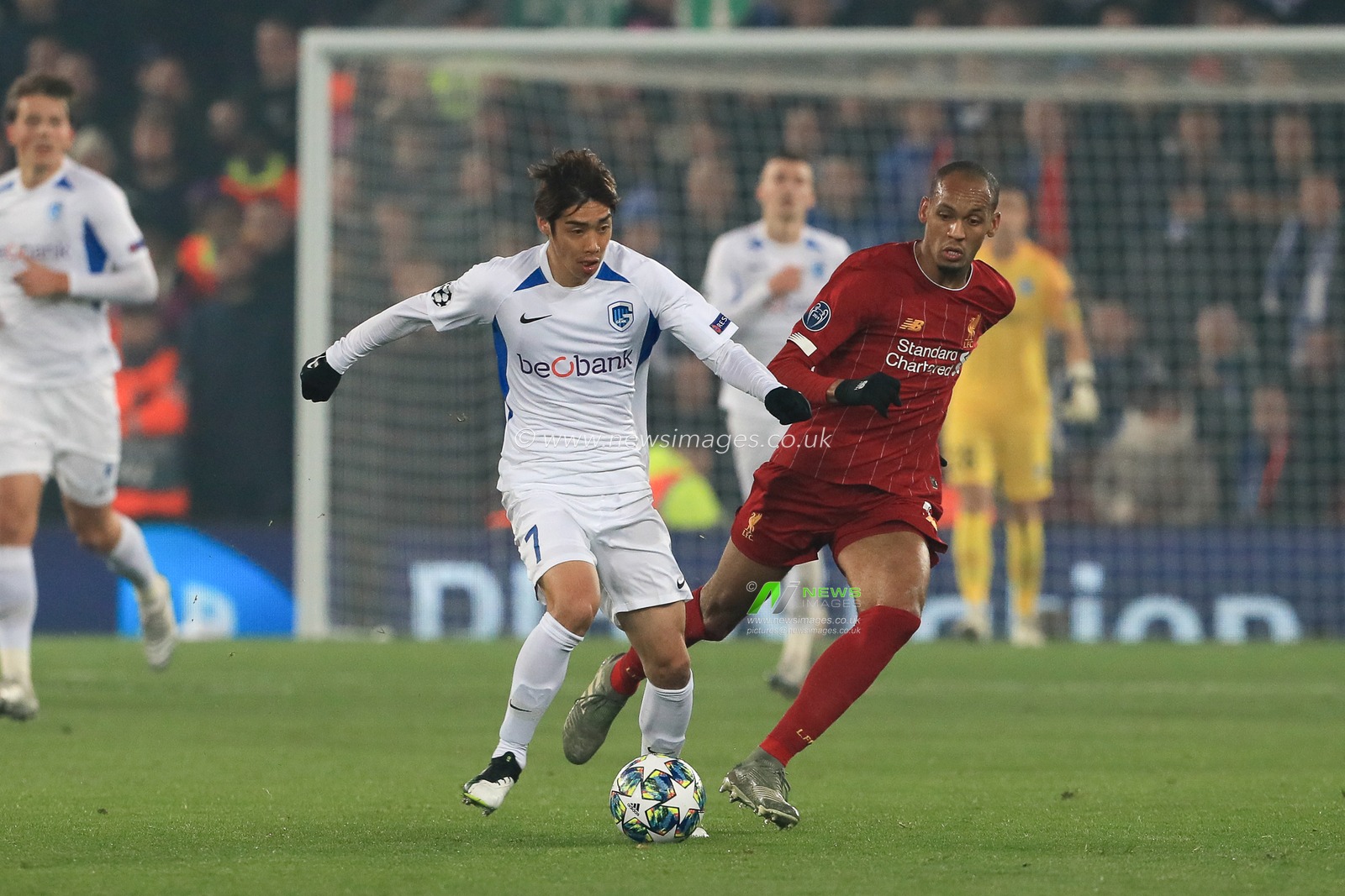 5th November 2019, Anfield, Liverpool, England; UEFA Champions League, Liverpool v KRC Genk : Junya Ito (7) of KRC Genk battles with Fabinho (3) of Liverpool  

Credit: Mark Cosgrove/News Images
