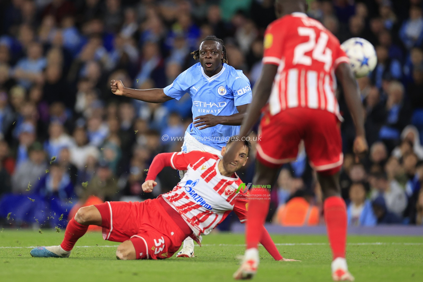 Jeremy Doku #11 of Manchester City crosses the ball during the UEFA Champions League match Manchester City vs Red Star Belgrade at Etihad Stadium, Manchester, United Kingdom, 19th September 2023

(Photo by Conor Molloy/News Images)