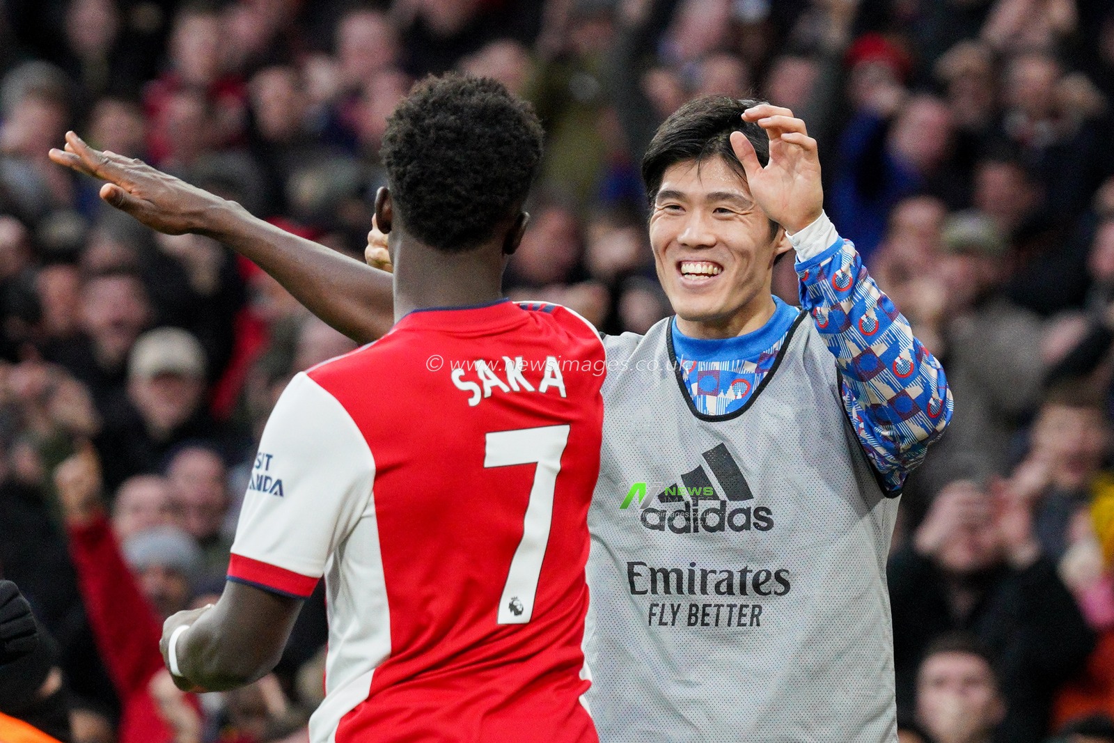 Bukayo Saka #7 of Arsenal celebrates scoring Arsenal second of the game with Takehiro Tomiyasu #18 of Arsenal