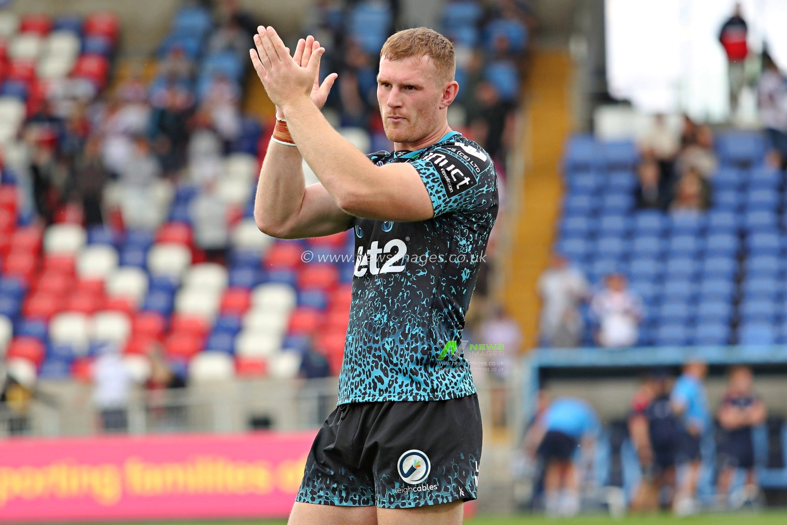 Jack Hughes of Leigh Leopards applauds the fans after the Betfred Super League Round 14 match Wakefield Trinity vs Leigh Leopards at DIY Kitchens Stadium, Wakefield, United Kingdom, 15th June 2025

(Photo by Sam Eaden/News Images)