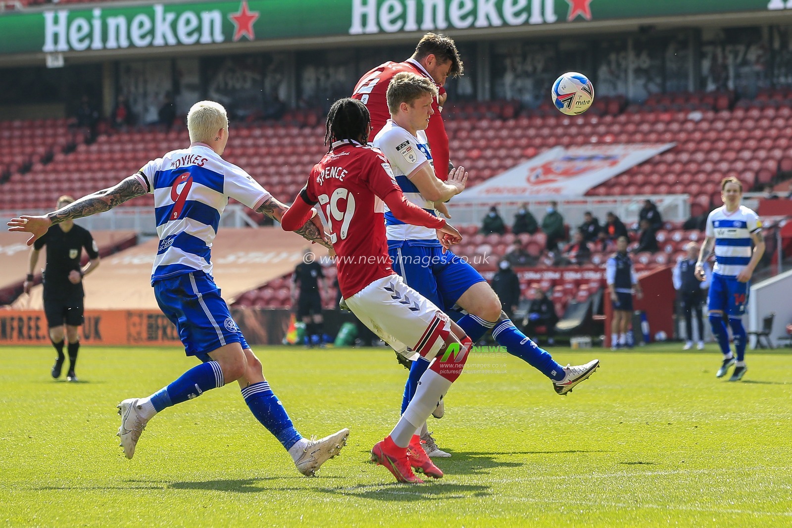 Grant Hall #4 of Middlesbrough heads the ball towards the Queens Park Rangers goal