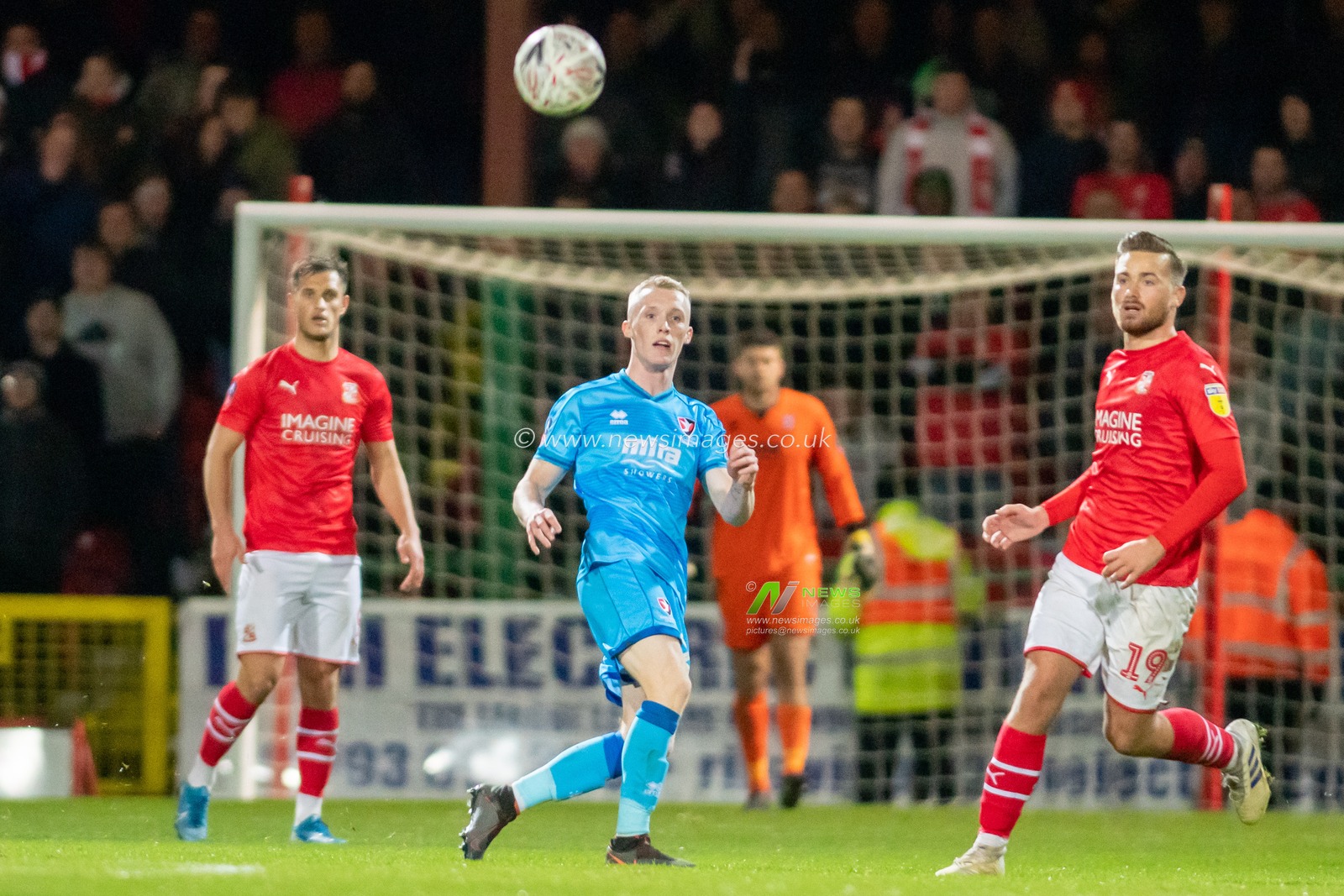 19th November 2019, County Ground, Swindon, England; Emirates FA Cup, First Round Replay, Swindon Town v Cheltenham Town : Jake Doyle-Hayes of Cheltenham Town lofts the ball forward.

Credit: Gareth Dalley/News Images