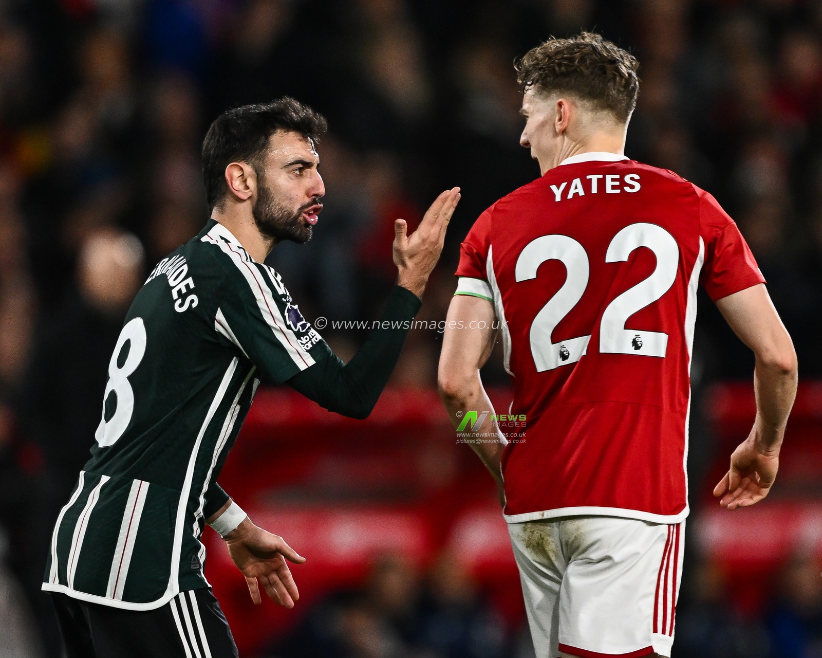 Bruno Fernandes of Manchester United speaks to Ryan Yates of Nottingham Forest during the Premier League match Nottingham Forest vs Manchester United at City Ground, Nottingham, United Kingdom, 30th December 2023

(Photo by Craig Thomas/News Images)
