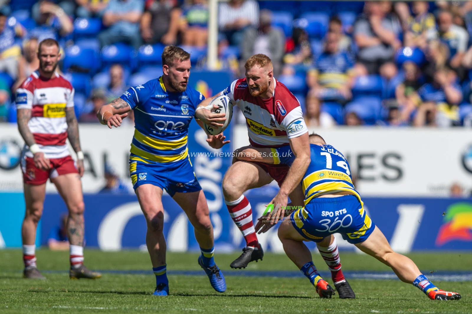 12th May 2019 , Halliwell Jones Stadium, Warrington, England ; Coral Challenge Cup 2019, Round 6, Warrington Wolves vs Wigan Warriors ; Joe Bullock of Wigan Warriors is tackled by Jason Clark of Warrington Wolves 


Credit: Richard Long/News Images