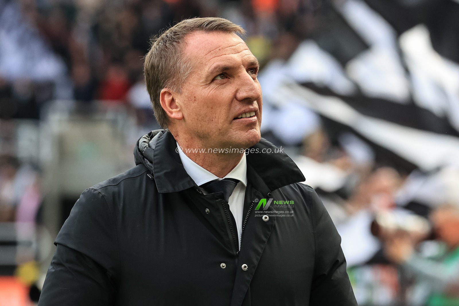 Brendan Rogers manager of Leicester City looks up into the directors box
