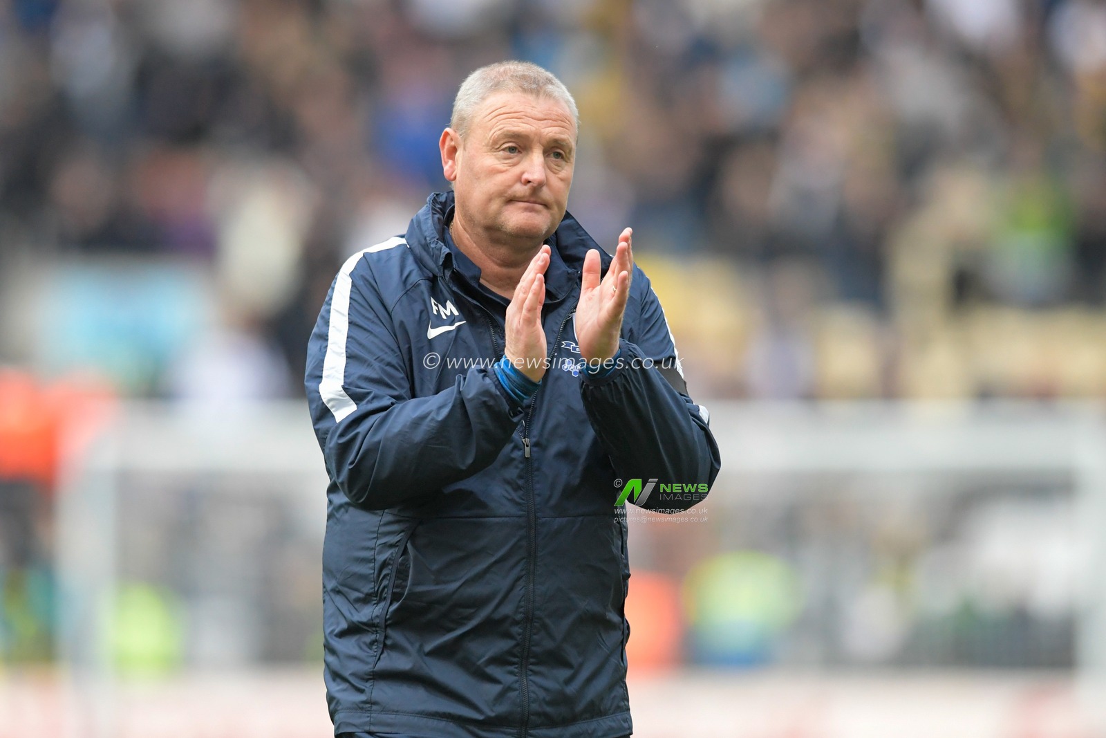 Frankie McAvoy manager of Preston North End applauds the home supporters at the end of the game after his side were held to a 0-0 draw against Derby County