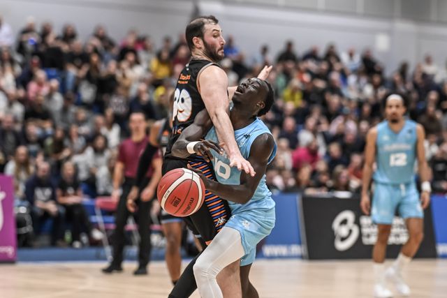 Padiet Wang of Surrey Scorchers is fouled by Skyler White of Cheshire Phoenix during the British Basketball Championship match Cheshire Phoenix vs Surrey Scorchers at Ellesmere Port Sports Village, Ellesmere Port, United Kingdom, 19th November 2023

(Photo by Craig Thomas/News Images)