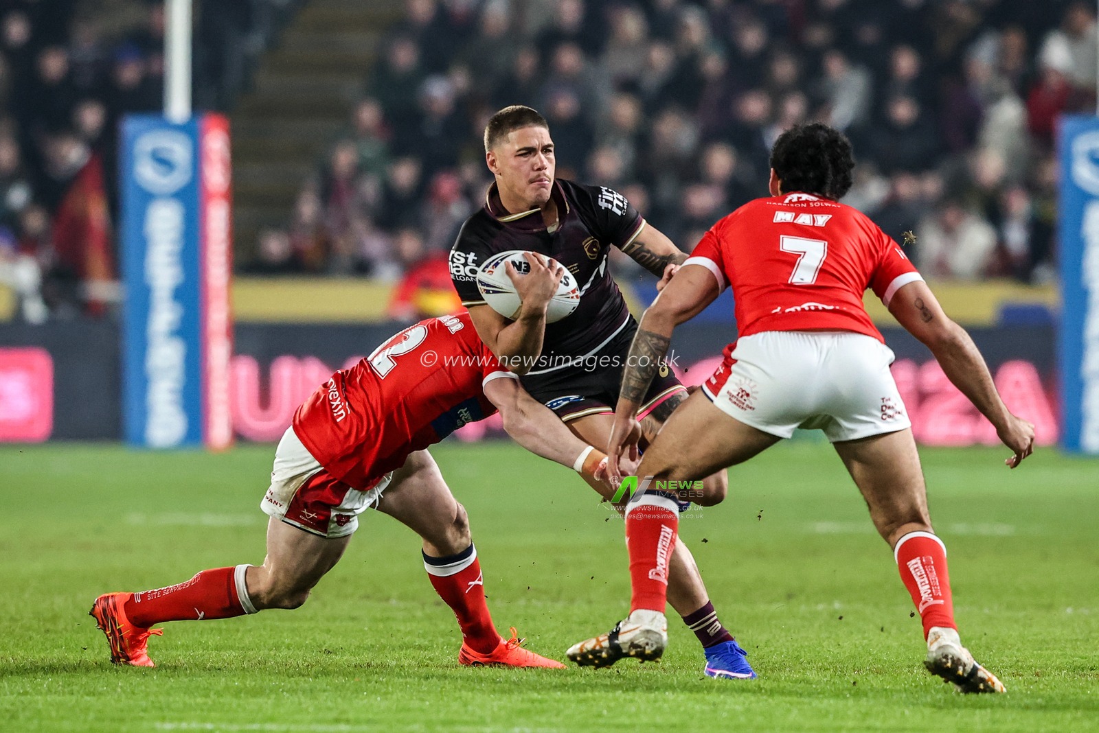 Grant Anderson of Brisbane Broncos is tackled by James Batchelor of Hull KR and Tyrone May of Hull KR during the World Club Challenge 2026 match Hull KR vs Brisbane Broncos at MKM Stadium, Hull, United Kingdom on 19 February 2026

(Photo by Alfie Cosgrove/News Images)