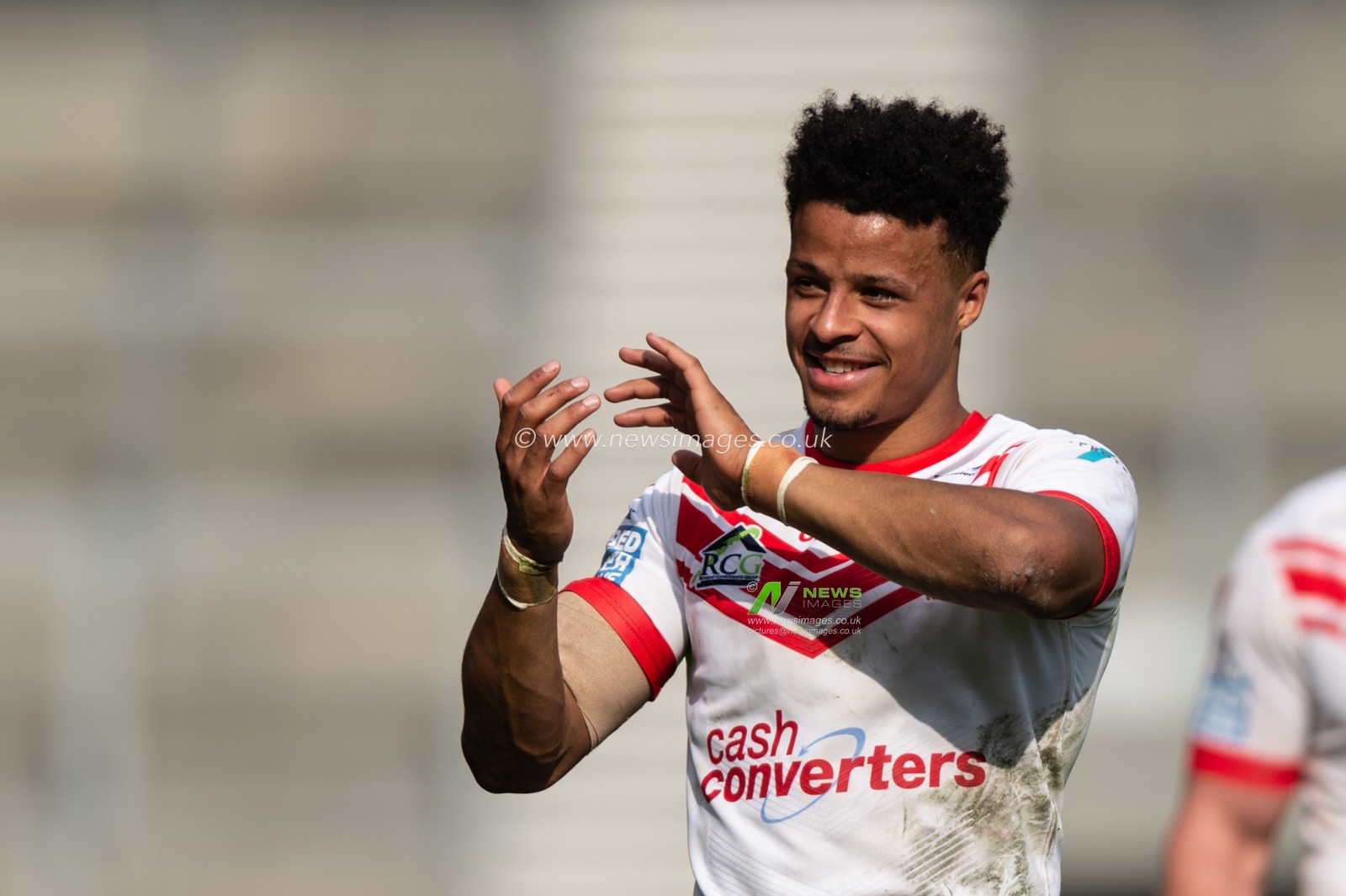 22nd April 2019 , Totally Wicked Stadium, St Helens, England;  Betfred Super League, Round 12, St Helens vs Hull FC, Regan Grace of St Helens celebrates the victory

Credit: Richard Long/News Images