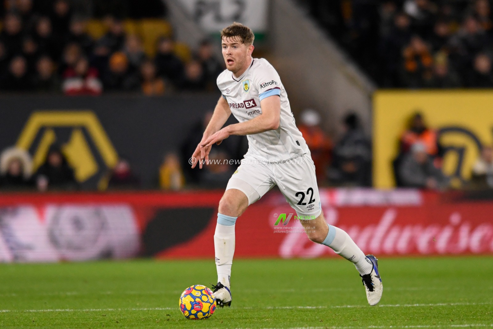 Nathan Collins #22 of Burnley runs forward with the ball
