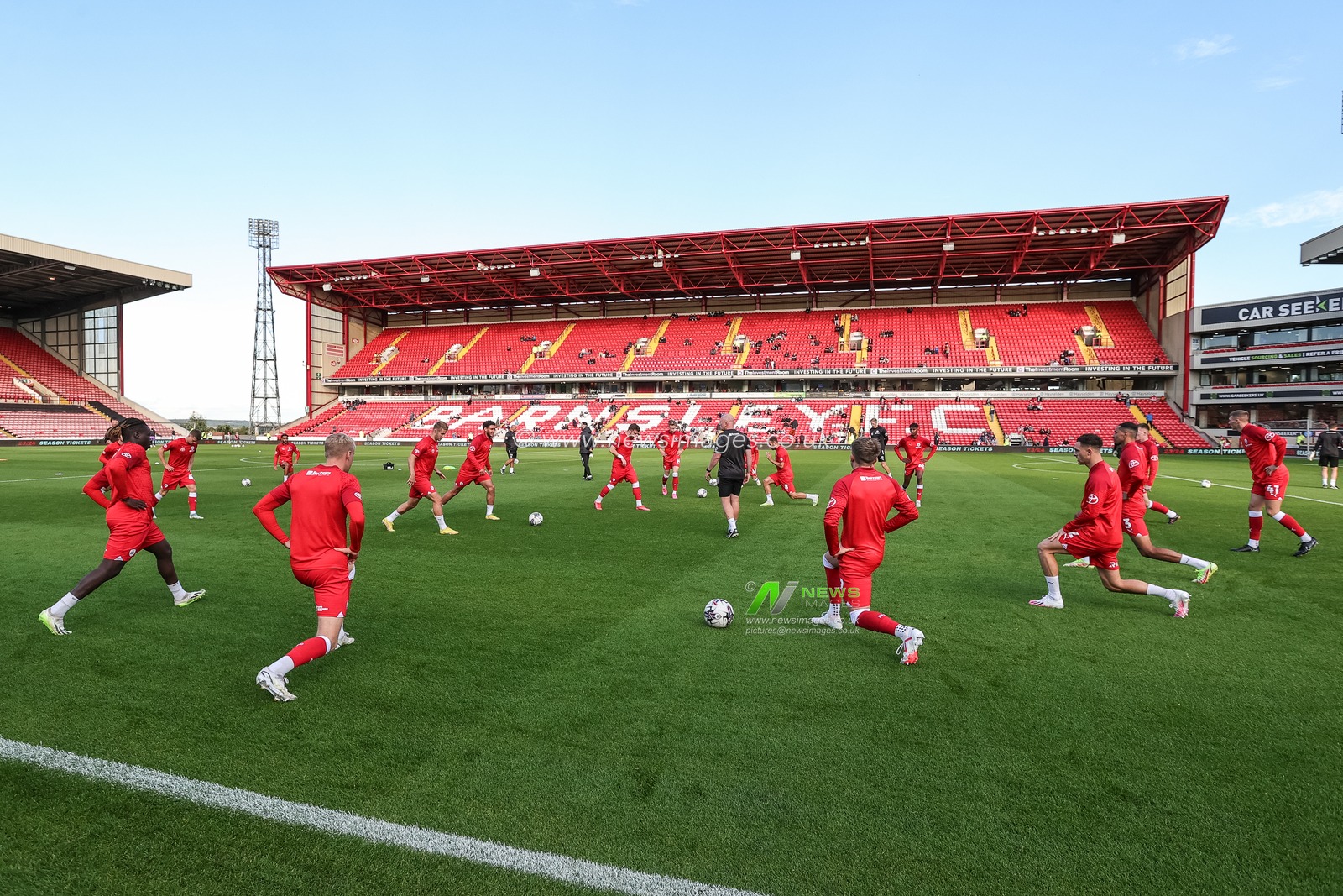 Barnsley players in the pregame warmup session during the Carabao Cup match Barnsley vs Tranmere Rovers at Oakwell, Barnsley, United Kingdom, 8th August 2023

(Photo by Mark Cosgrove/News Images)