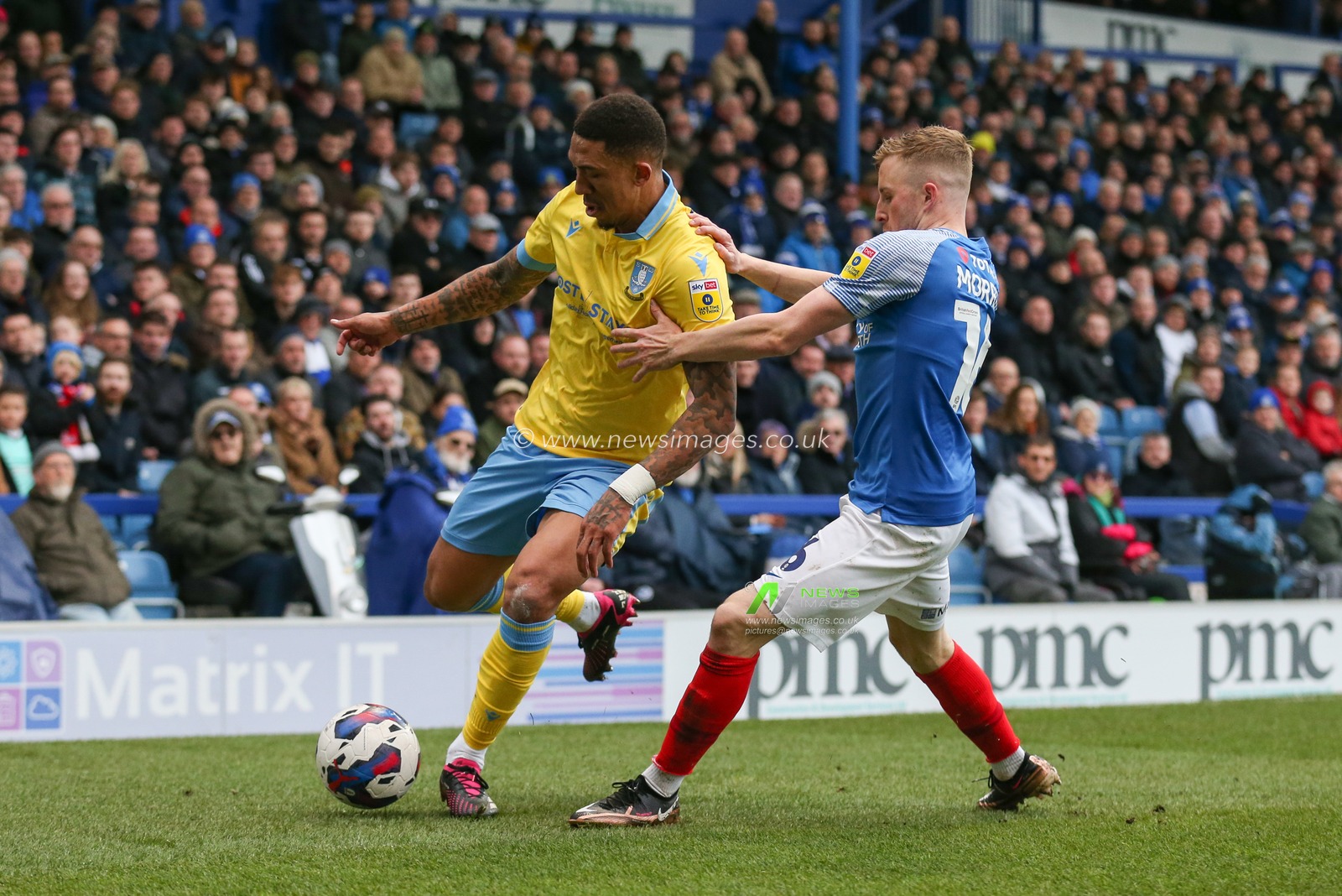 Liam Palmer #2 of Sheffield Wednesday and Joe Morrell #16 of Portsmouth tussle for the ball during the Sky Bet League 1 match Portsmouth vs Sheffield Wednesday at Fratton Park, Portsmouth, United Kingdom, 11th March 2023

(Photo by Arron Gent/News Images)