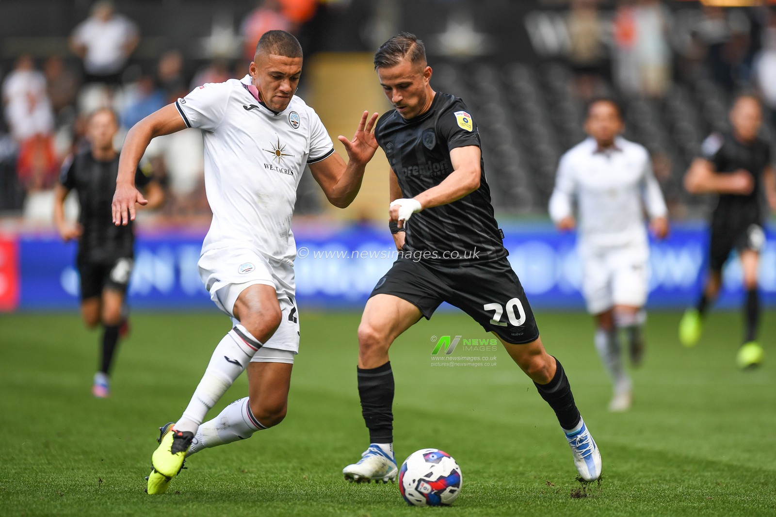 Dimitris Pelkas #20 of Hull City Under pressure from /Nathan Wood #23 of Swansea City during the Sky Bet Championship match Swansea City vs Hull City at Swansea.com Stadium, Swansea, United Kingdom, 17th September 2022

(Photo by Mike Jones/News Images)