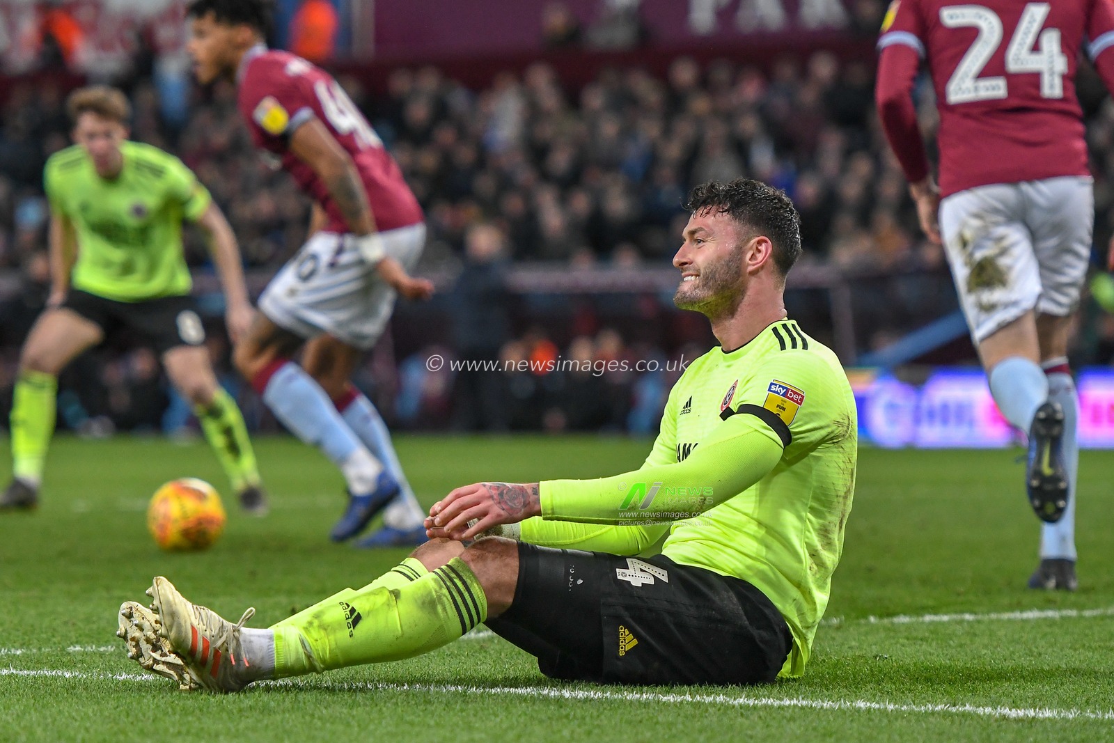 8th February 2019, Villa Park, Birmingham, England ; Sky Bet Championship, Aston Villa v Sheffield United : Gary Madine (14) of Sheffield United is challenged in the Aston Villa box

Credit: Gareth Dalley/News Images

English Football League images are subject to DataCo Licence
