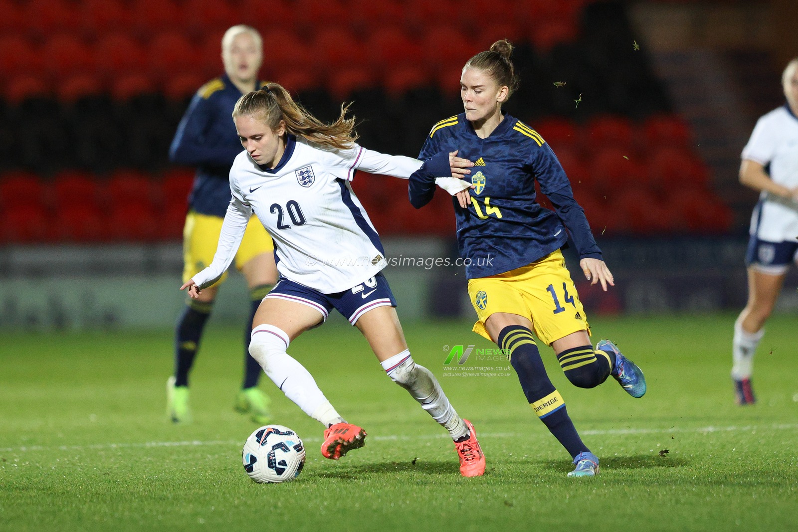 Sarah Brasero of England Women U23 holds off My Cato of Sweden U23 during the Women's International Friendly match England Women U23 vs Sweden women U23 at Eco-Power Stadium, Doncaster, United Kingdom, 2nd December 2024

(Photo by Alex Roebuck/News Images)